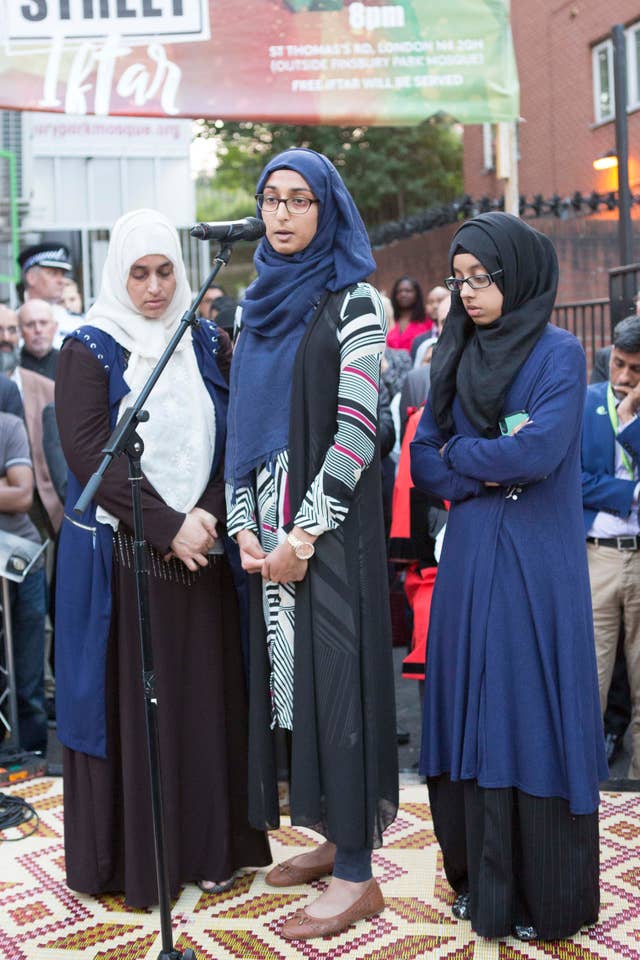 Ruzina Akhtar (centre) daughter of Makram Ali, previously thanked the community for their support (Rick Findler/PA)