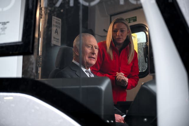 Charles taking the controls of the tram-train