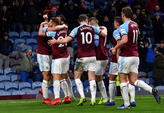 Burnley's James Tarkowski (left) celebrates with his team-mates