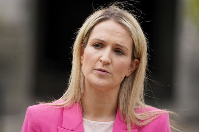 Justice Minister Helen McEntee listens to a journalist's question