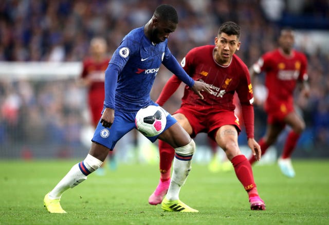 Tomori (left) has impressed since breaking into Chelsea's starting line-up