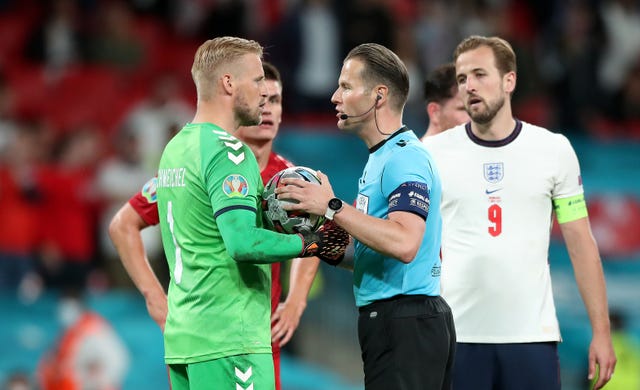 Kasper Schmeichel (left) had a laser shone into his face at Wembley