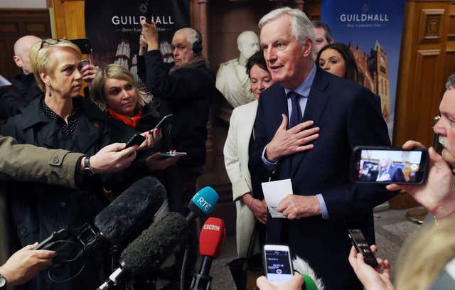 Mr Barnier arrives to meet business stakeholders and cross-border groups at the Guildhall in Derry (Niall Carson/PA)