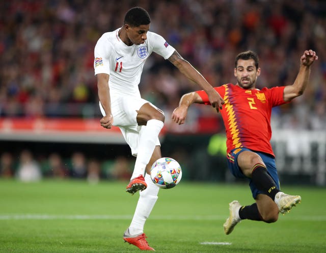 Marcus Rashford slots home his goal