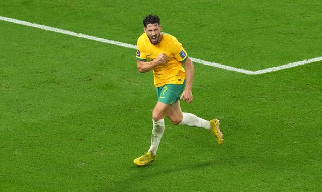 Mathew Leckie celebrates scoring against Denmark