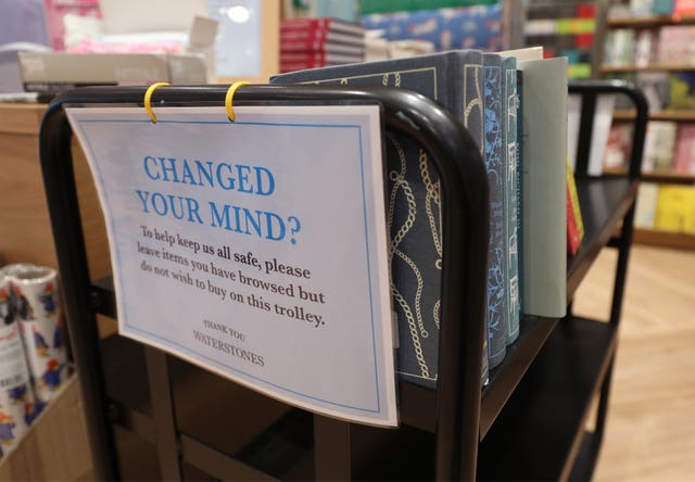A trolley for books that have been browsed but not purchased by customers in a London branch of Waterstones