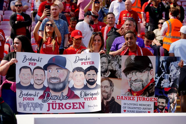 Liverpool fans hold up signs for Jurgen Klopp