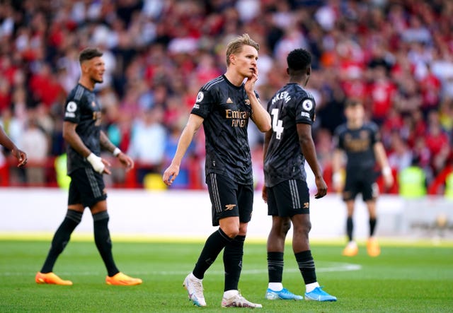 Nottingham Forest upset Arsenal to clinch safety and hand Manchester City title