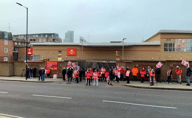 Striking postal workers