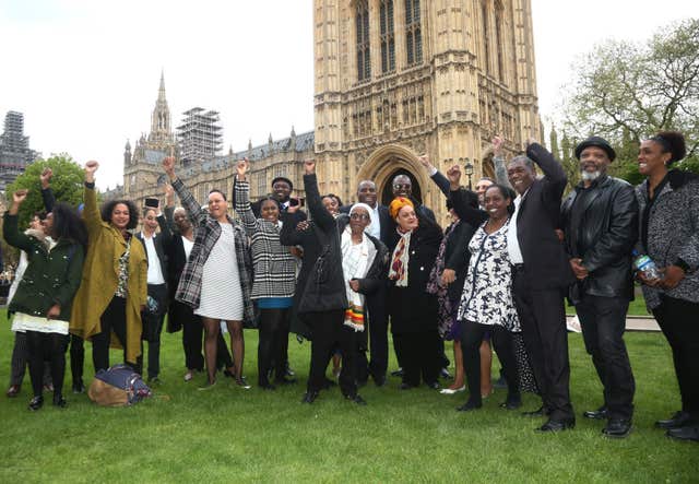 David Lammy MP (centre, back row) with members of the Windrush generation (Yui Mok/PA)
