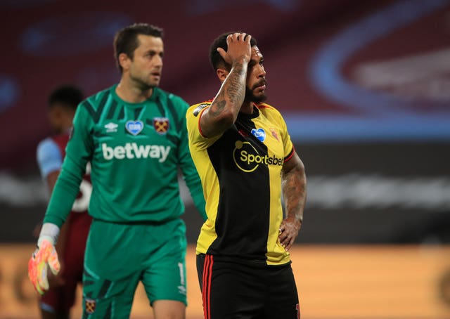 Andre Gray reacts after a missed chance
