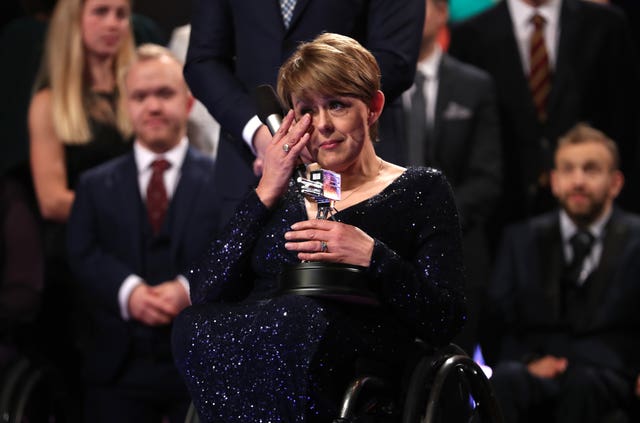 Tanni Grey-Thompson wipes away a tear after winning the Lifetime Achievement award during the BBC Sports Personality of the Year ceremony