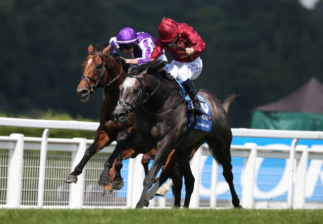 Roaring Lion (right) gets the better of Saxon Warrior in the Coral-Eclipse at Sandown