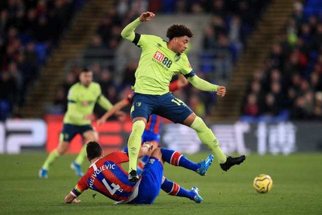 Crystal Palace's Luka Milivojevic tackles Bournemouth's Arnaut Danjuma