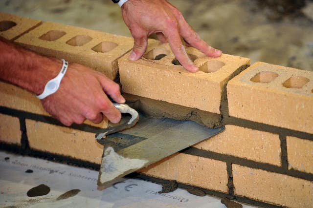 A bricklayer at work