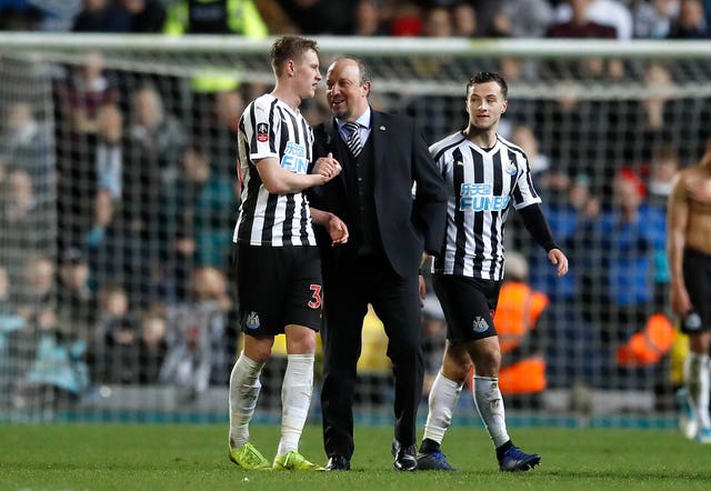 Sean Longstaff with Newcastle manager Rafael Benitez.