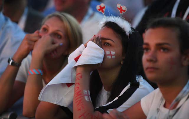 England supporters look on in anguish in Hyde Park as England suffer semi-final defeat