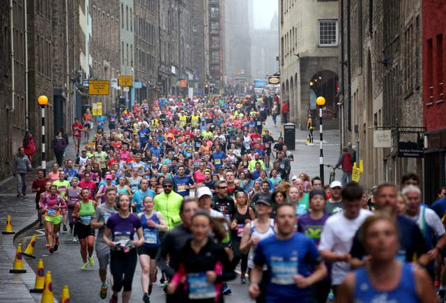 It was a cooler start to the day in central Scotland where competitors were running in the 2018 Edinburgh Marathon (Jane Barlow/PA)