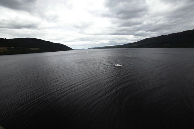 View from above of a yacht on Loch Ness