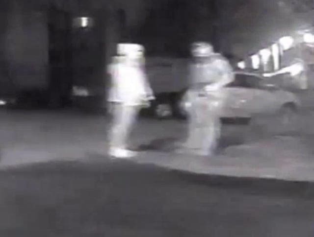 Wayne Couzens (right) and Sarah Everard beside a vehicle outside Poynders Court on Poynders Road, Clapham, south London (CCTV/Metropolitan Police/PA)