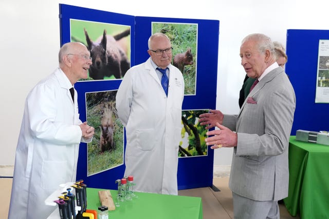 The King speaks to researchers at the APHA project