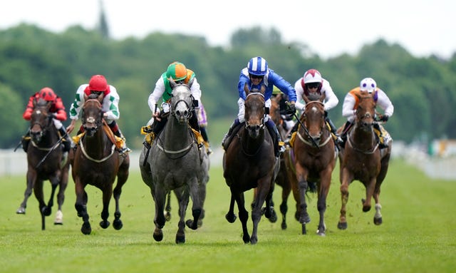 Baashir (right) and Jim Crowley just pip Paul Hanagan and National League