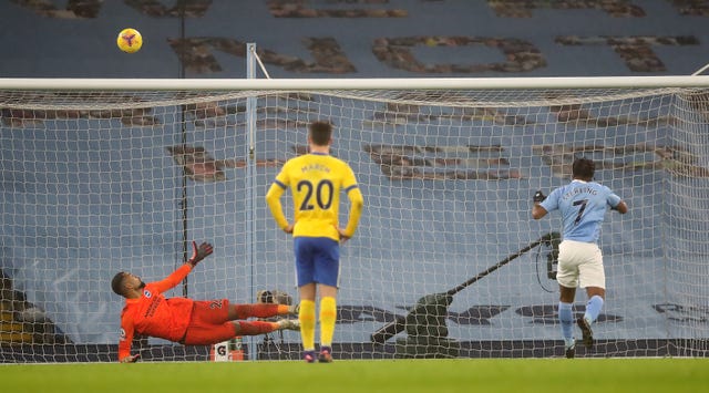 Raheem Sterling, right, sends his penalty over the bar against Brighton