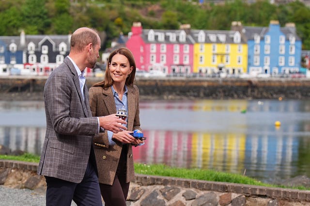William and Kate walking along the harbour side in Tobermory