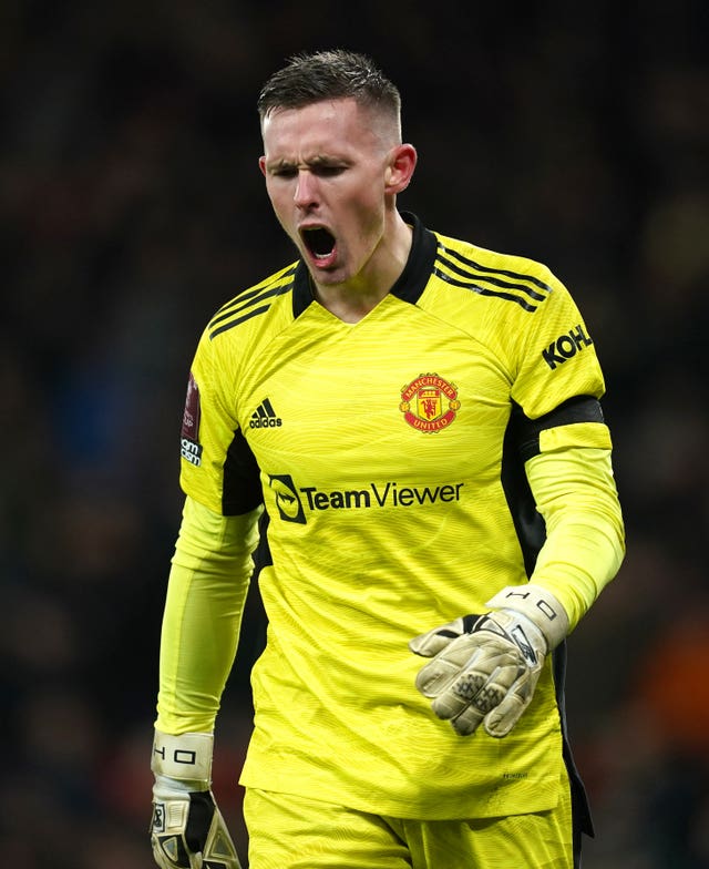 Manchester United goalkeeper Dean Henderson reacts