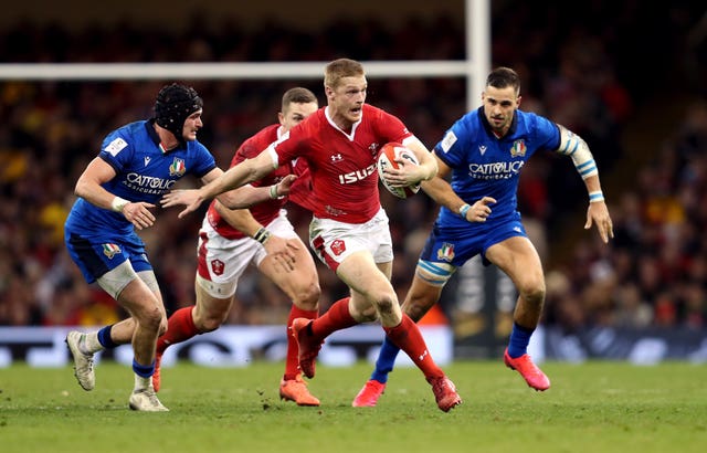 Johnny McNicholl finds a gap in the Italian defence