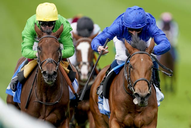 Divine Light ridden by William Buick (right) wins The Godolphin Under Starters Orders Maiden Fillies’ Stakes at Newmarket Racecourse