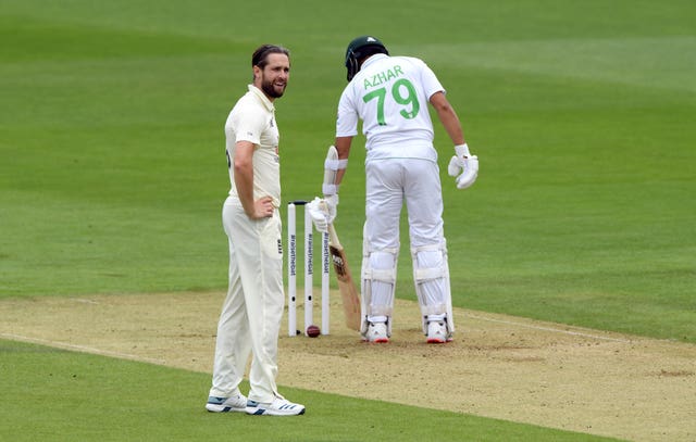 Chris Woakes cannot believe it after the ball hits the stumps but fails to dislodge the bails