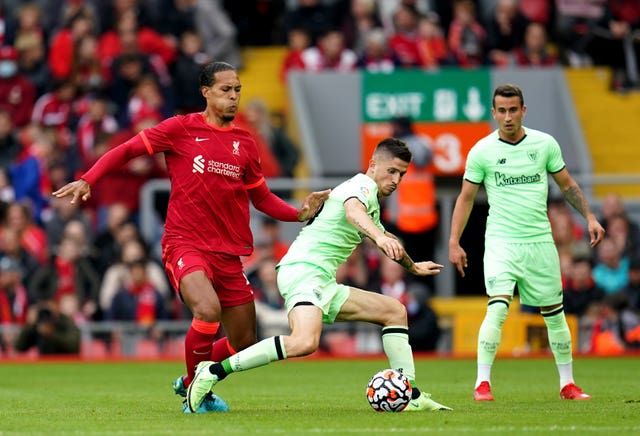 Liverpool defender Virgil Van Dijk wins the ball against Athletic Bilbao