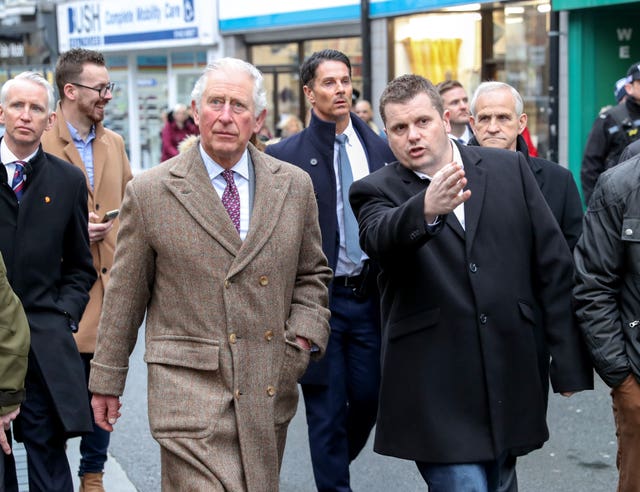 The Prince of Wales meets residents and businesses affected by recent floods in Pontypridd