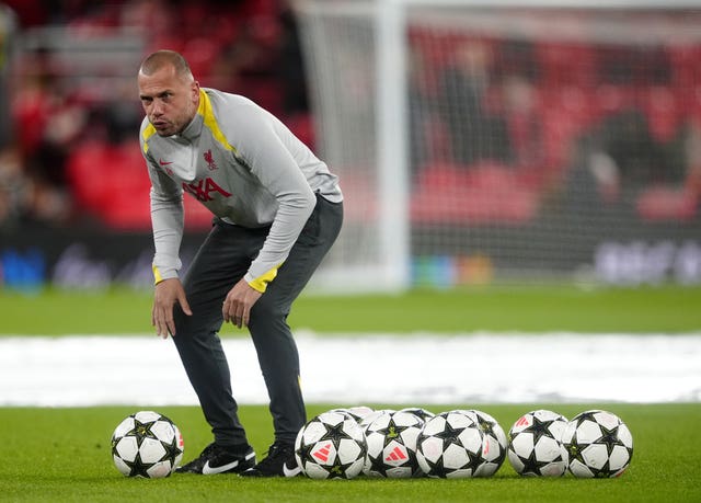 Former Liverpool assistant coach John Heitinga on the pitch