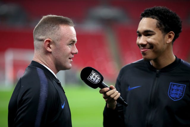 Rooney speaks to FA TV presenter Craig Mitch before kick-off