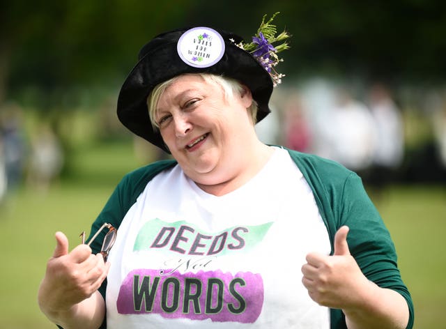 A woman joins the parade in Scotland