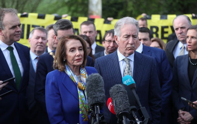 Nancy Pelosi address the media at the border