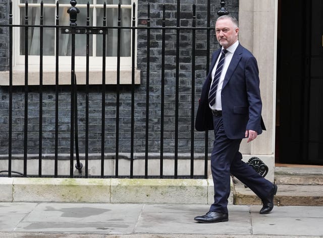 Steve Reed walking on Downing Street