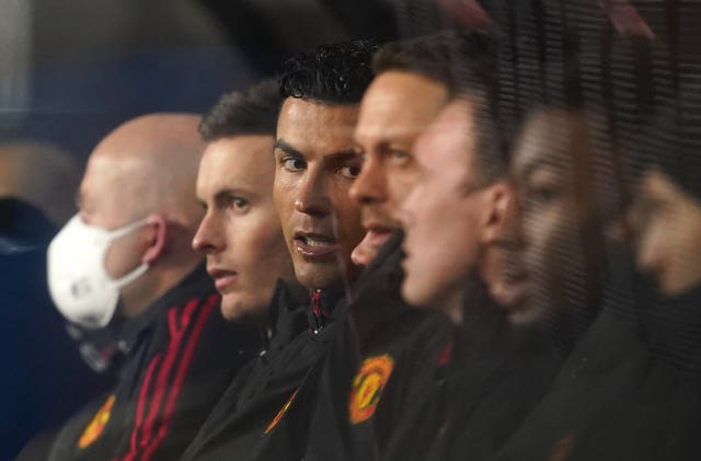 Cristiano Ronaldo, centre, on the substitutes'' bench