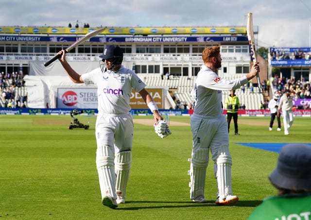 Joe Root and Jonny Bairstow leave the field on day four of the fifth Test against India