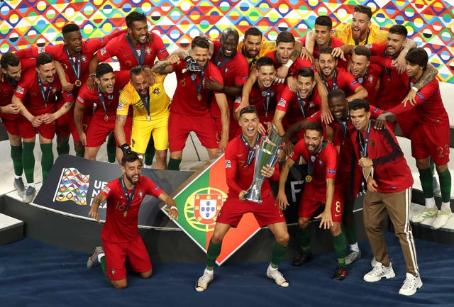 Cristiano Ronaldo lifts the Nations League trophy following Portugal's victory over Holland in the final