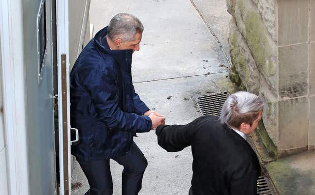 McKie is escorted into Chester Crown Court (Peter Byrne/PA)