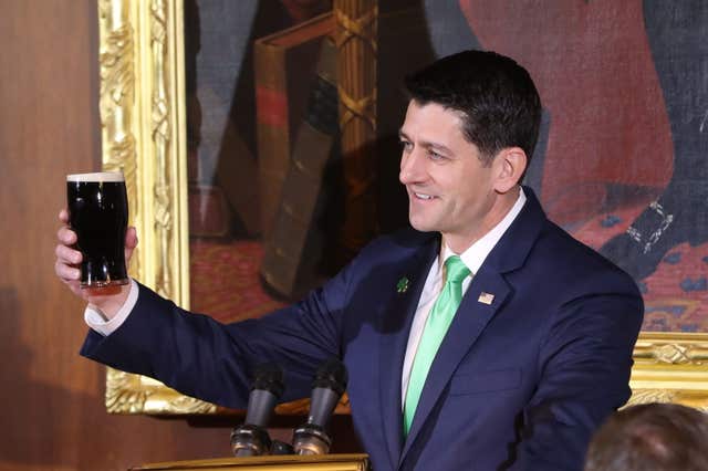 Speaker of the House Paul Ryan toasts the Taoiseach with a pint of Guinness during the Speaker's Lunch (Niall Carson/PA)
