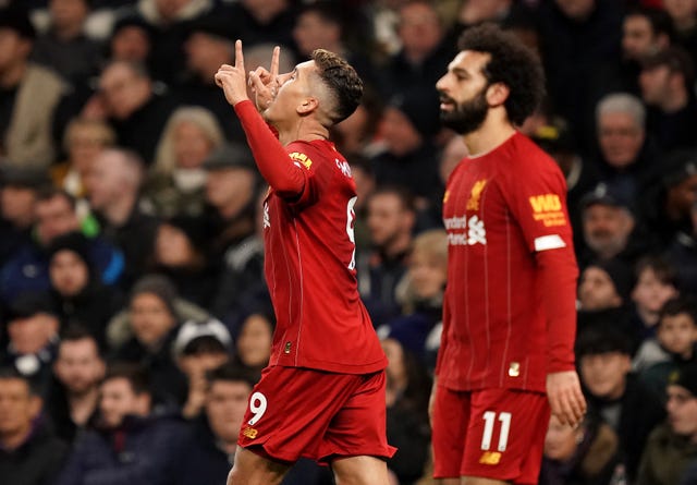 Liverpool's Roberto Firmino (left) celebrates scoring during his side's 1-0 defeat of Tottenham