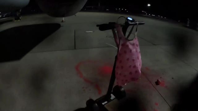 Screen grab taken from handout footage issued by Palestine Action of pro-Palestinian activists breaking into RAF Brize Norton in Oxfordshire, and spray painting the tarmac next to a Airbus Voyager air-to-air refuelling tanker with red paint