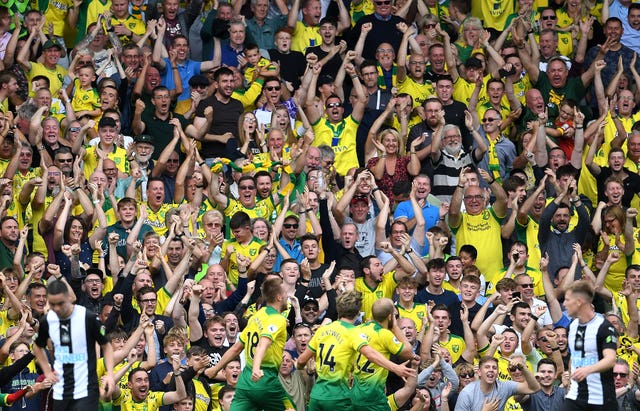 Pukki (right) celebrates scoring his side’s first goal