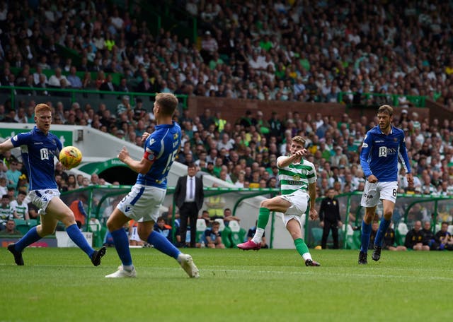 Ryan Christie, centre, curls home Celtic's second goal