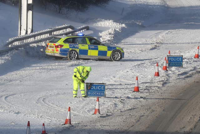 The M876 to Glasgow is closed due to snow (Andrew Milligan/PA)