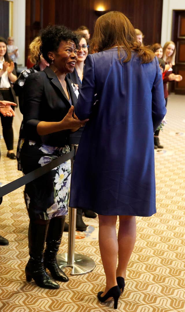 The Duchess of Cambridge shares a few words with Professor Jacqueline Dunkley-Bent, who helped deliver both of her children (Peter Nicholls/PA)
